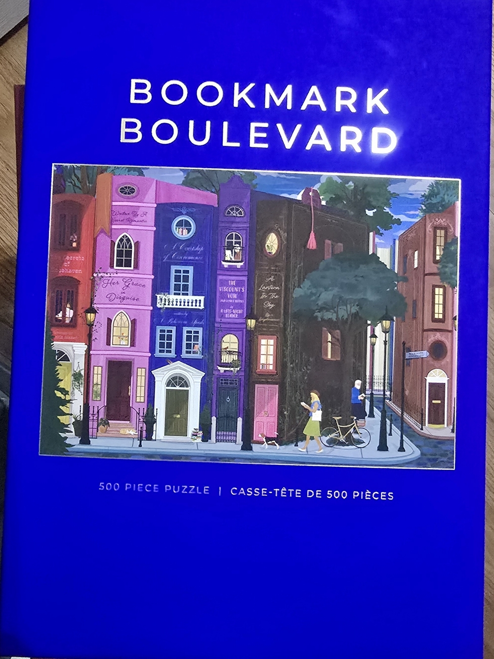 Bookmark Boulevard 500-Piece Puzzle - Vibrant Blue Box